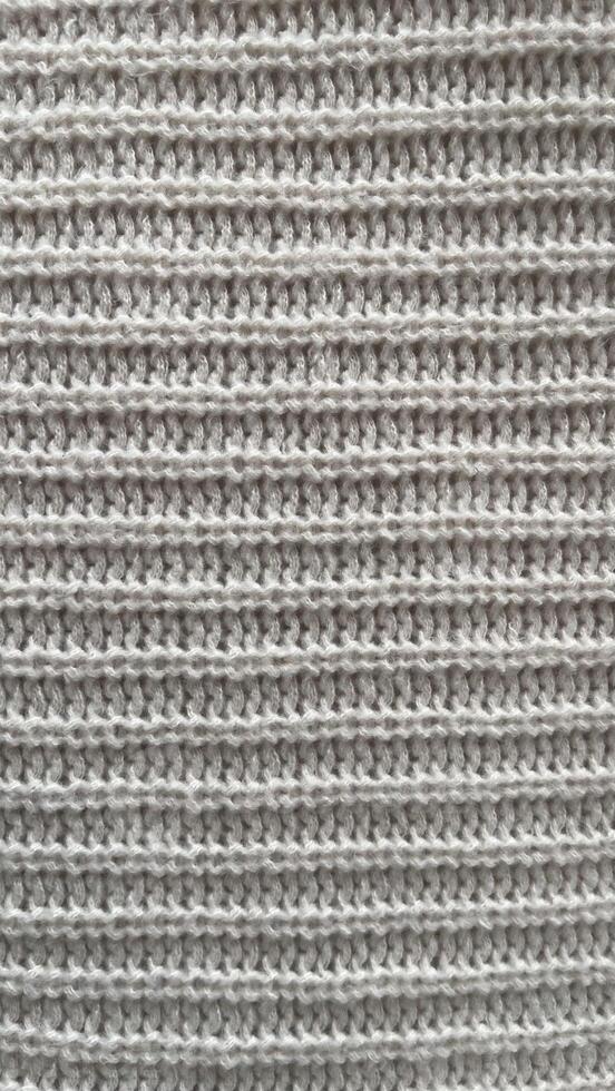 A knitted item with a white background.7 photo