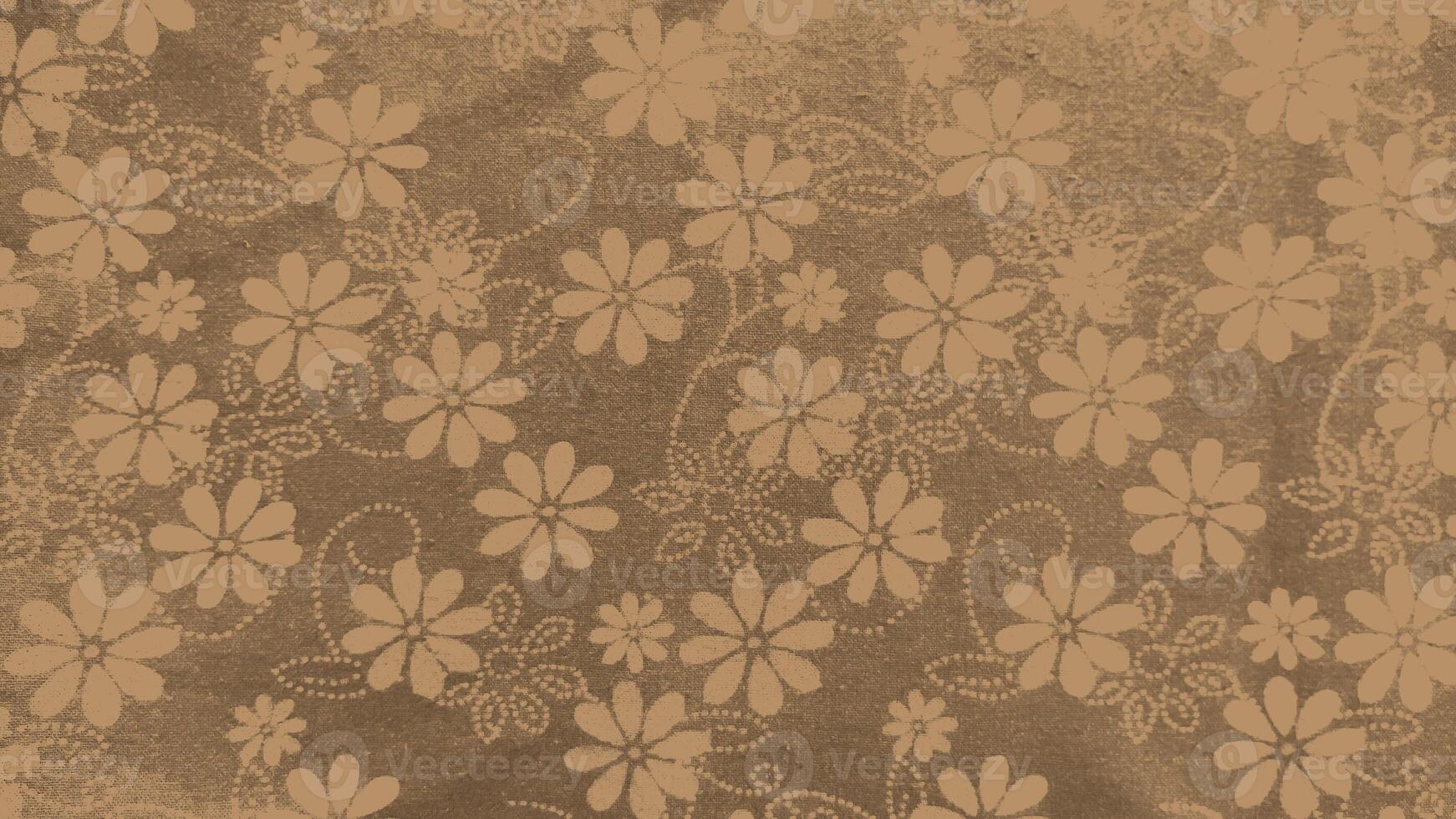 A brown background with a floral pattern photo