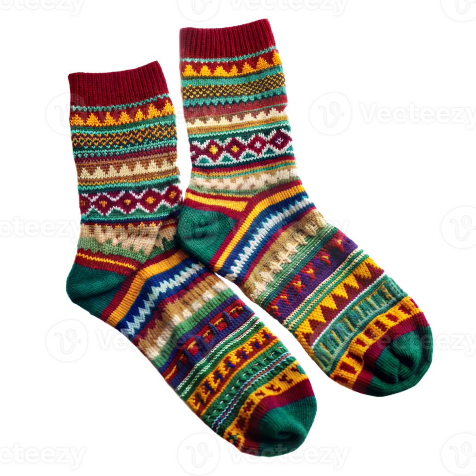Colorful patterned wool socks isolated on black, symbol of warmth and winter clothing. png