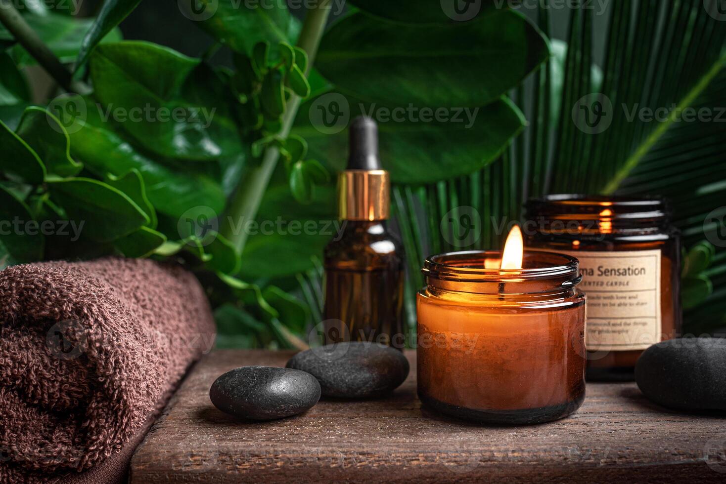 Spa concept with burning massage candles photo