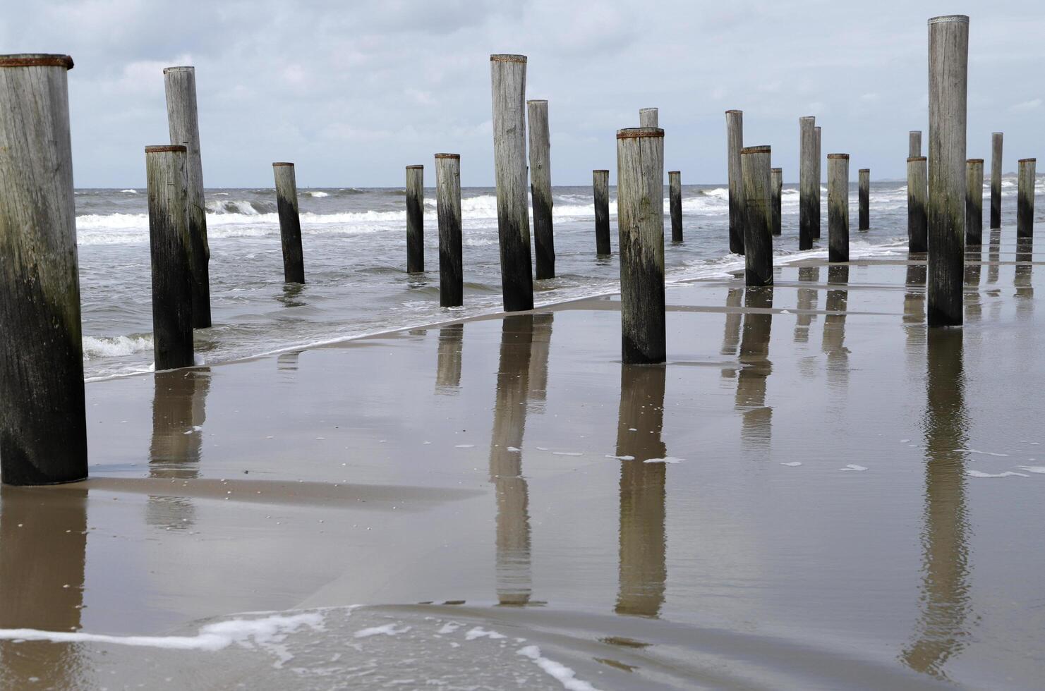 pole village, this was the location of the former village Petten, before it was taken by the sea,village petten at the north sea, the netherlands, photo