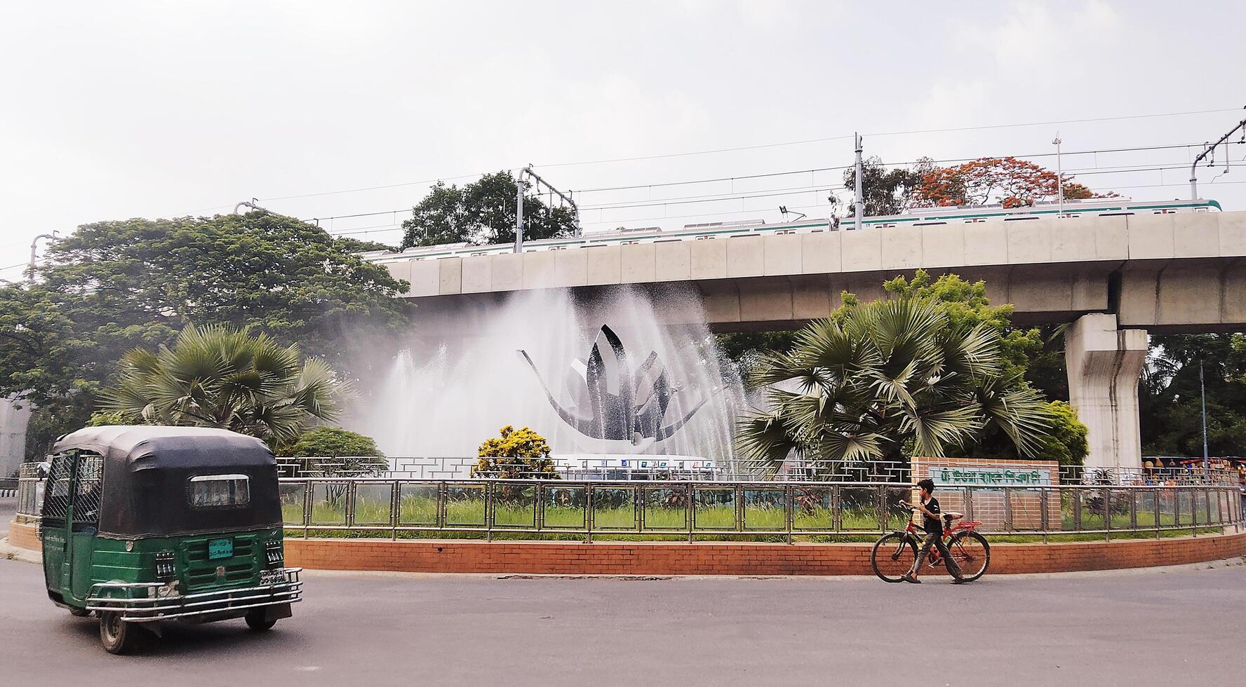 Splashing fountain in public park in City photo