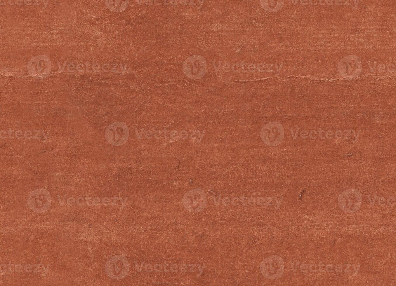 Earth brown colored Rhesho paper texture. Seamless handmade craft recycled paper background surface. Natural pigment applied by hand on one page side. 120gsm photo