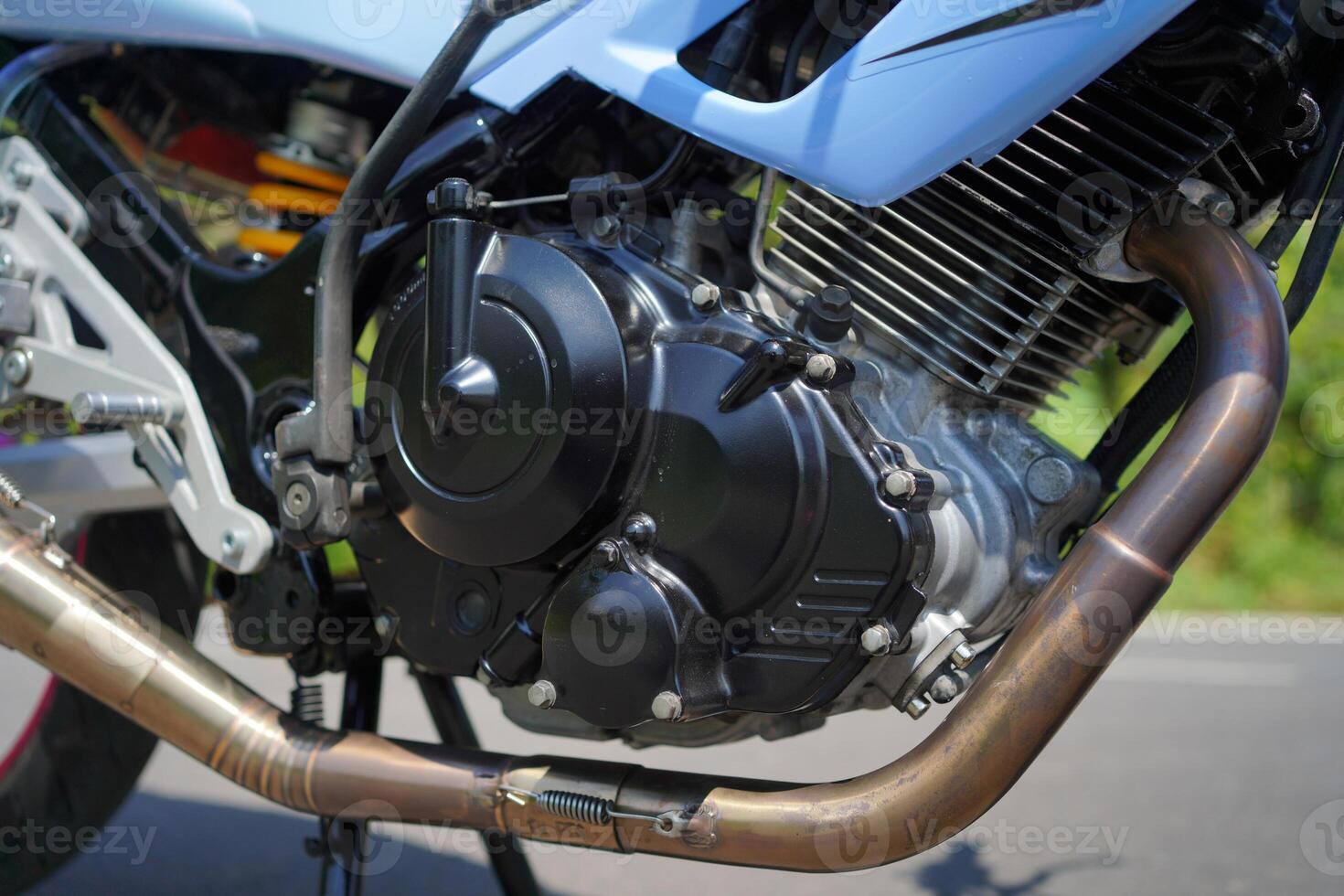 close up of a 4-Stroke underbone category motorbike engine photo