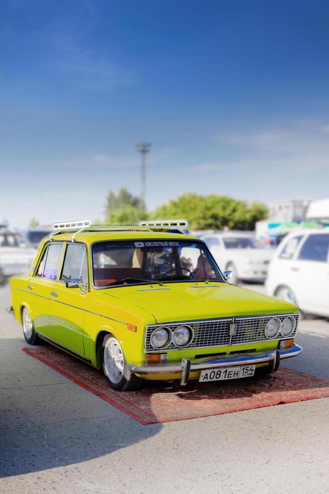 Russia, Novosibirsk, 23.06.2024, Old Soviet light green car at the exhibition, LADA Classic, Zhiguli 2106 photo