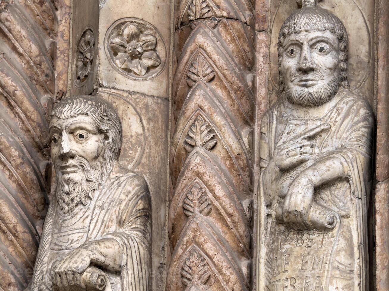 Verona dome cathedral church exterior sculptures detail. Romanesque sculpture attributed to the workshop of Veronese sculptor Brioloto photo