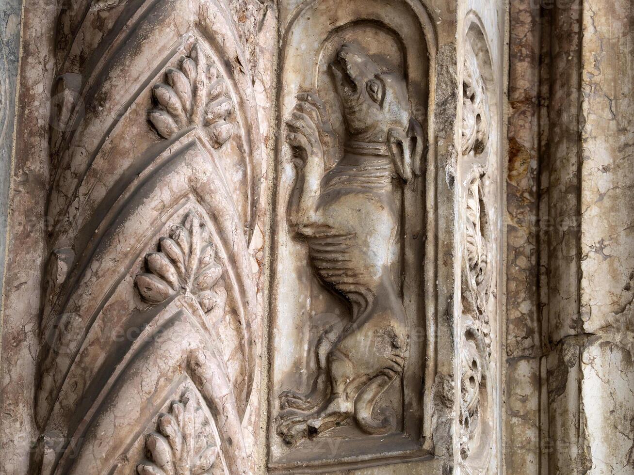 Verona dome cathedral church exterior sculptures detail. Romanesque sculpture attributed to the workshop of Veronese sculptor Brioloto photo