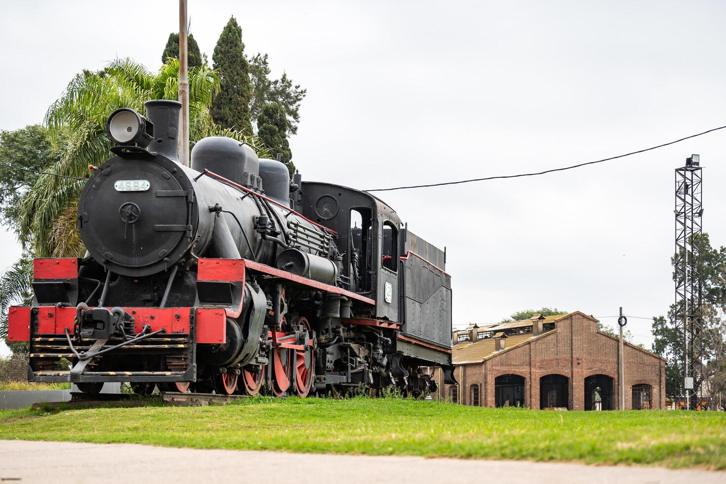 Balnearia, Cordoba, Argentina - June 21, 2024 - Locomotive located in the old Balnearia train station converted into a city monument. photo