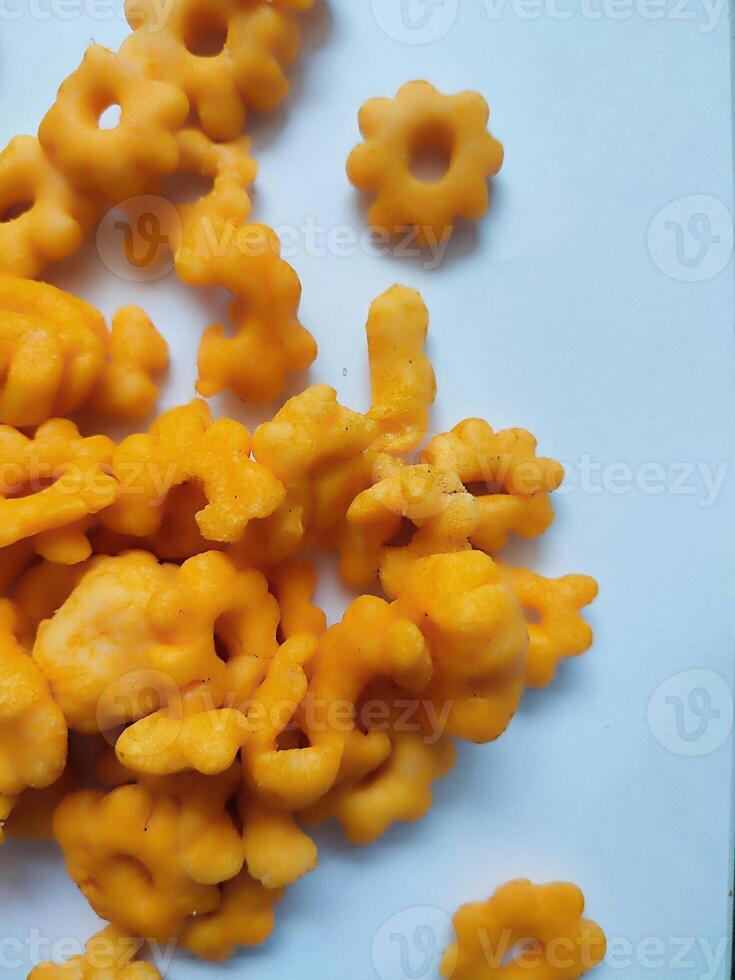 Sakura ribut, the fried dough is shaped like a flower, it tastes delicious. Snacks from Indonesia isolated on white background photo