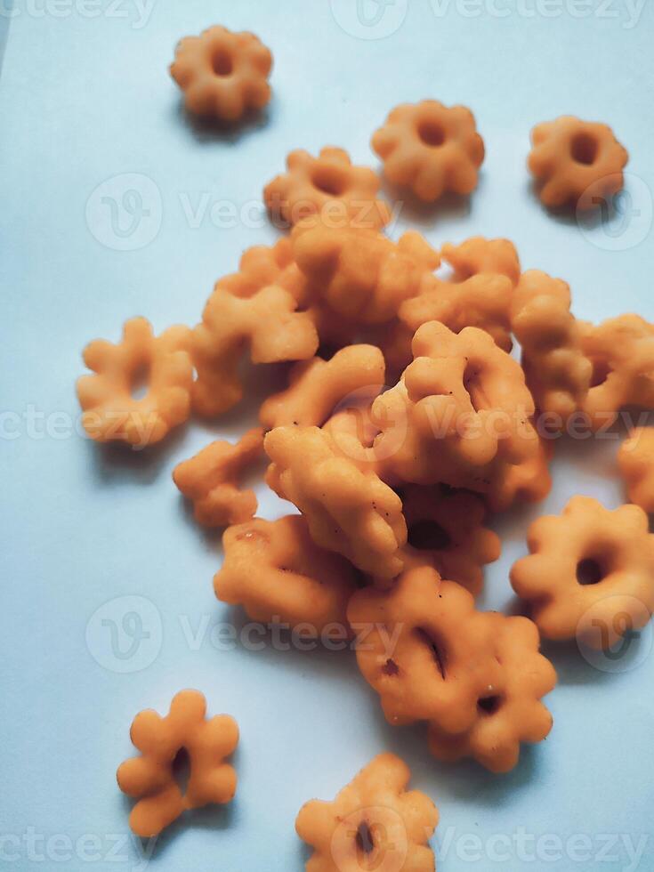 Sakura ribut, the fried dough is shaped like a flower, it tastes delicious. Snacks from Indonesia isolated on white background photo