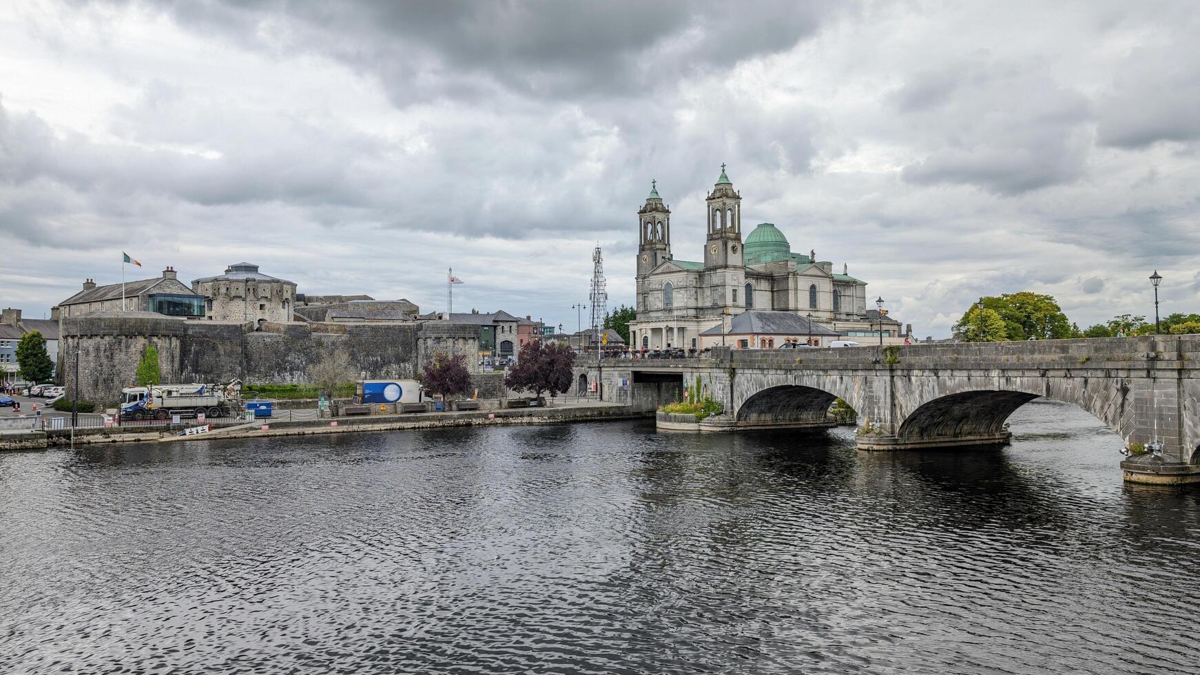 Beautiful old cityscape scenery, Church of Saints Peter and Paul by Shannon river at Athlone, town in Westmeath, Ireland, landmark and architecture background photo