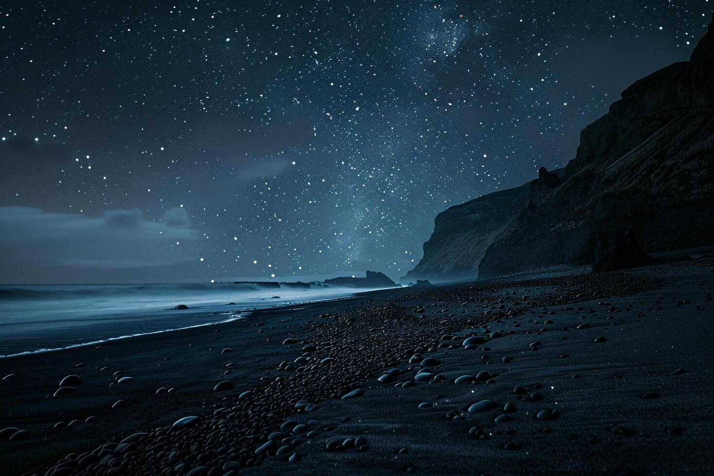Beach with black volcanic sand dotted with lavrocks under starry night sky nature background photo