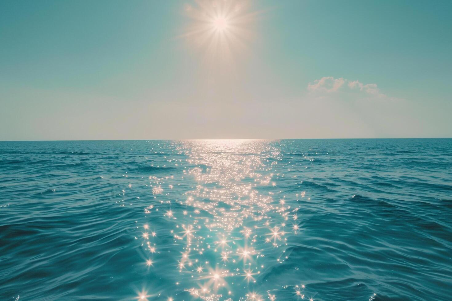Seascape Sunlight Creating Glittering Path Across the Surface of Calm Sea nature background photo