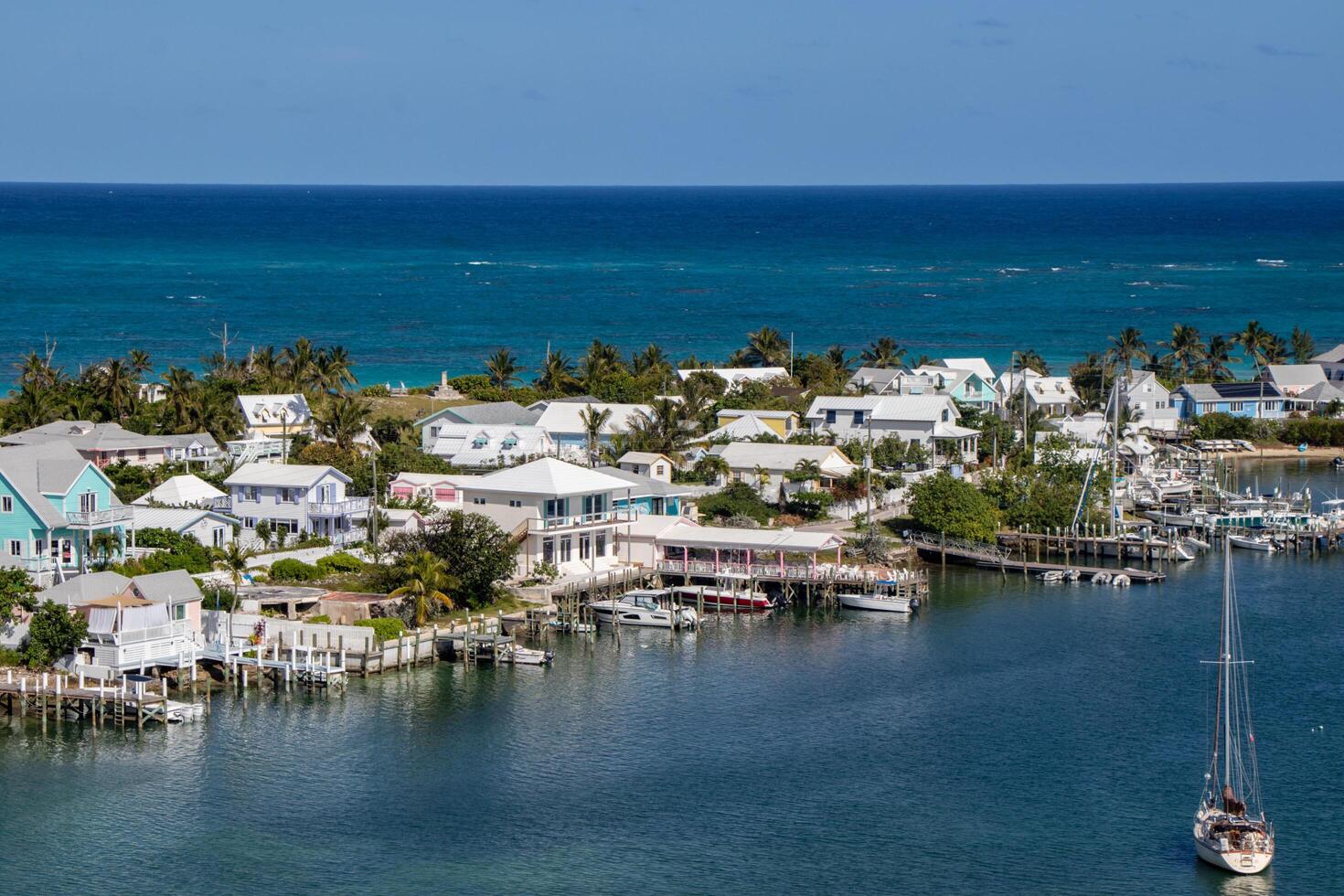 Hope Town, Abacos, Bahamas - 2024 - Cottages line the harbour and seaside in Hope Town photo