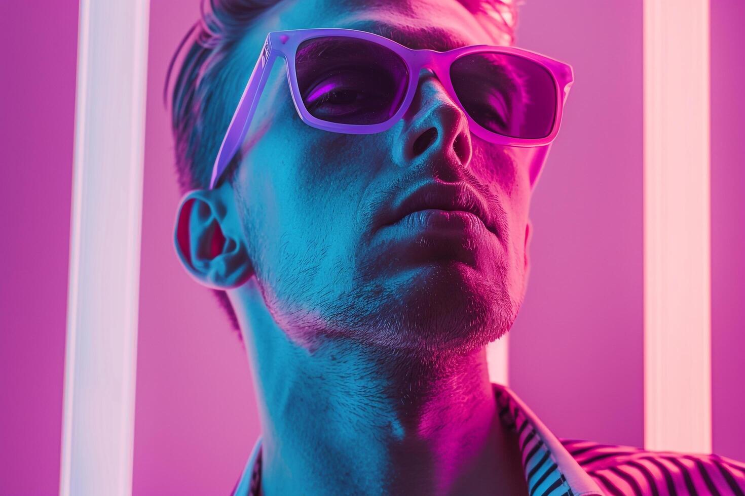 Handsome Fashion Male Model in Neon purple eyewear with Neon pink Background Trendy Urban Fashion StateMalet with a Stylish edge photo
