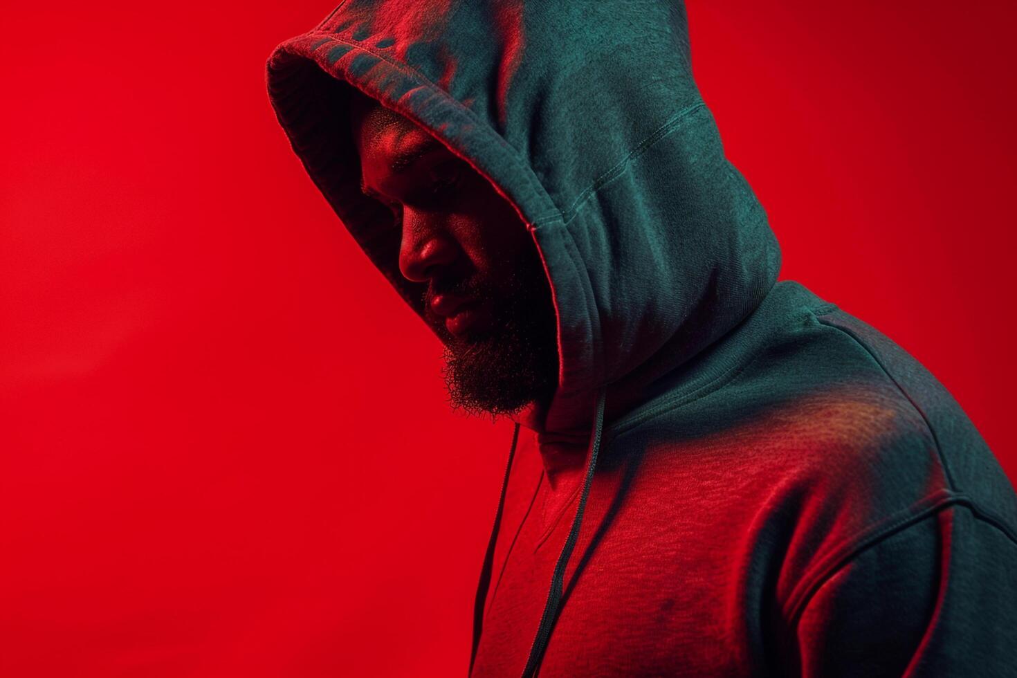 Hoodie Clad Male with Brick Red Background portrait Showcasing Fashion and Lifestyle eleMalets photo
