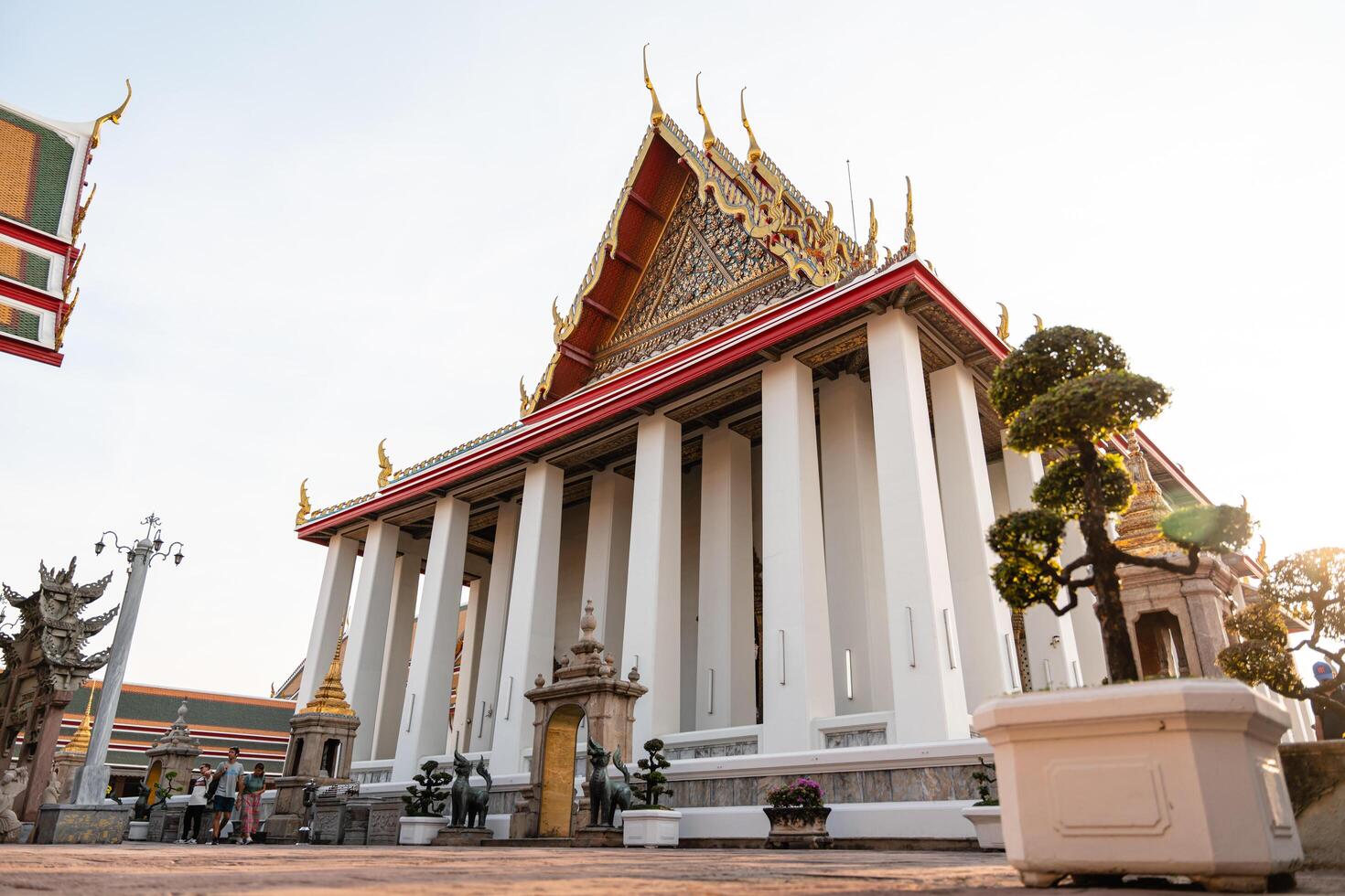 BANGKOK, THAILAND - FEBRUARY 14, 2023 Wat Pho also spelled Wat Po, a Buddhist temple complex in the Phra Nakhon District, Bangkok, Thailand. Known also as the Temple of the Reclining Buddha. photo