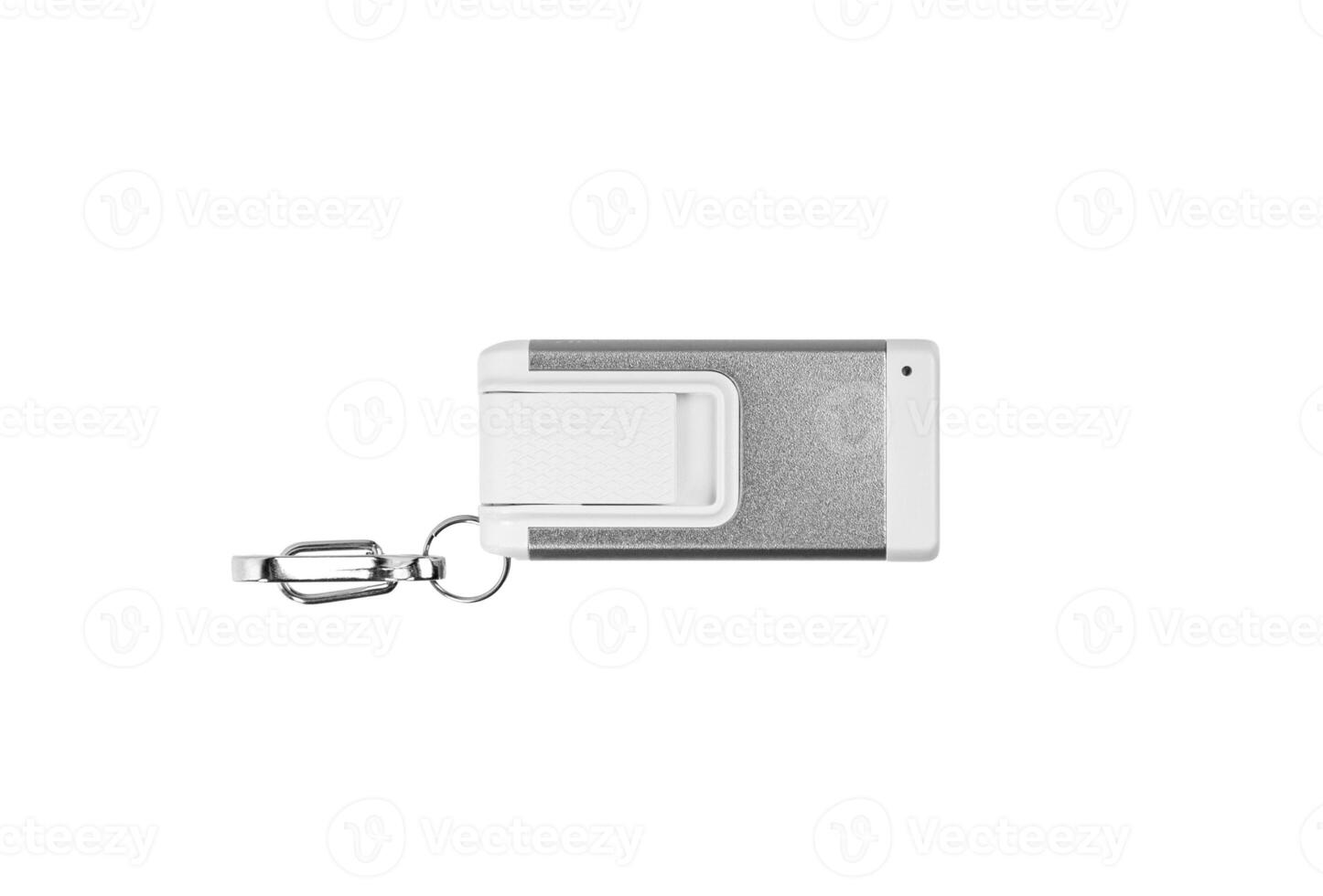 USB flashlight keychain.Metal LED flashlight isolate on a white back. Pocket lamp for dark time of day or dark rooms. photo