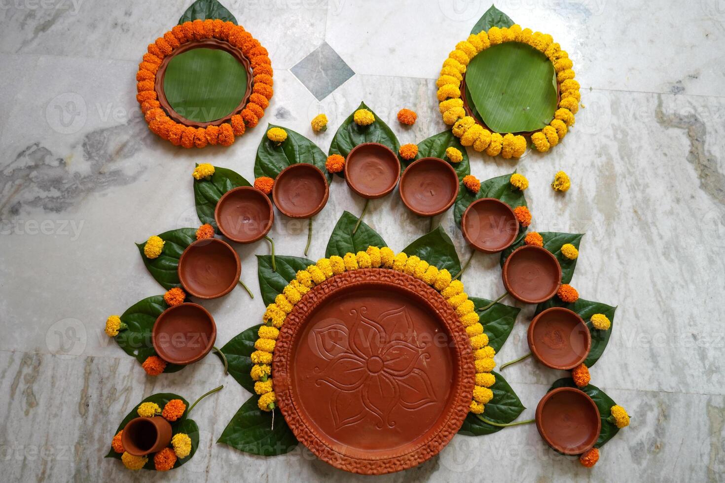 A Full set earthenware is ready to served bengali dishes in Rice Ceremony photo