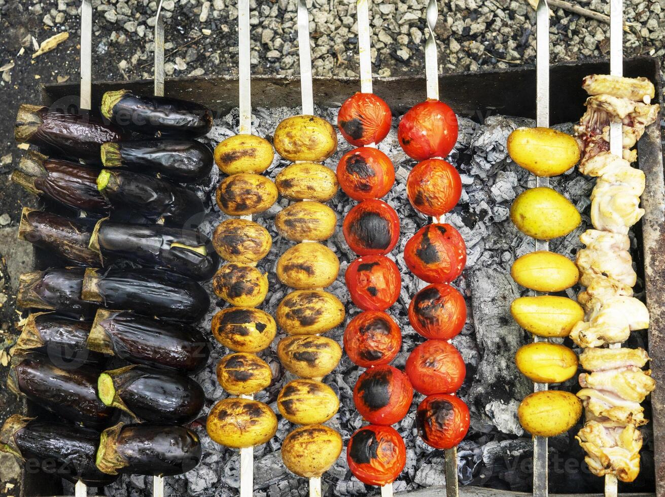 delicious grilled vegetables ,mushrooms, tomato, zucchini, potato photo