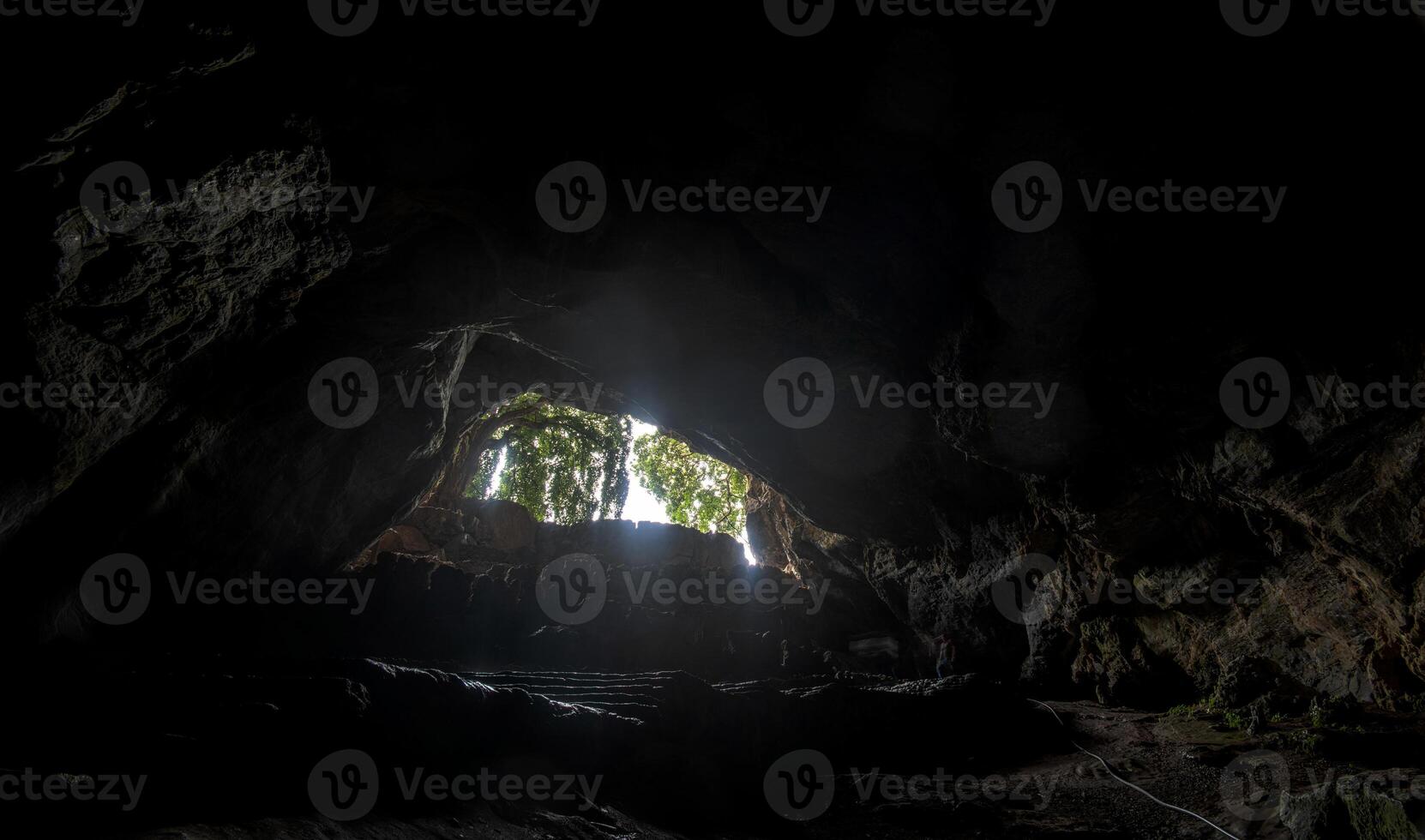 Light streaming into Grutas de Cacahuamilpa caves reveals stunning natural beauty at sunset photo