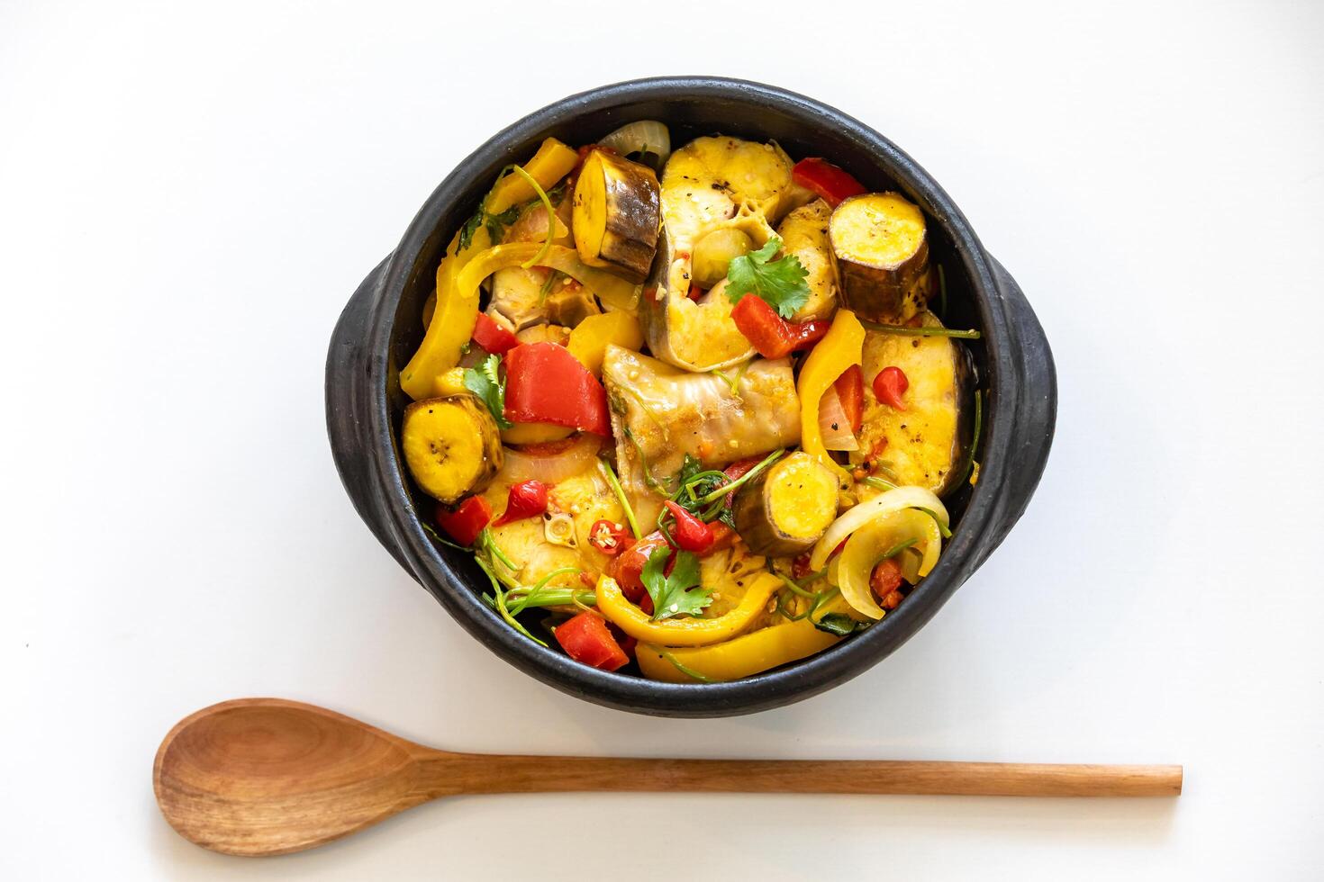 Typical Brazilian tropical fish stew with palm oil, coconut milk and traditional beach spices. Moqueca photo