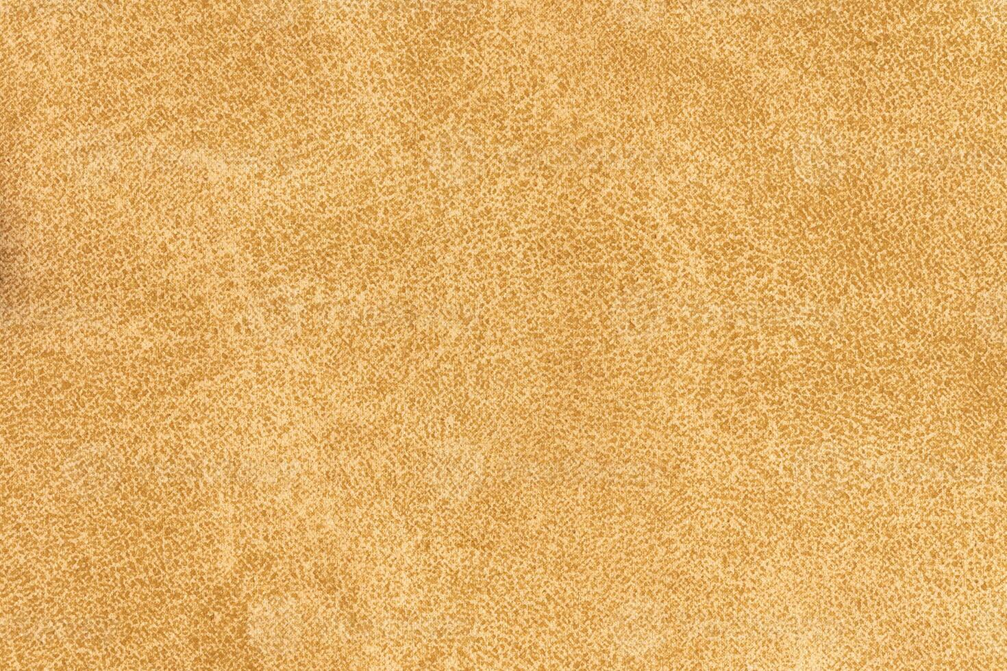 Yellow color abstract textile pattern background. Latte colour fabric material, colored background photo