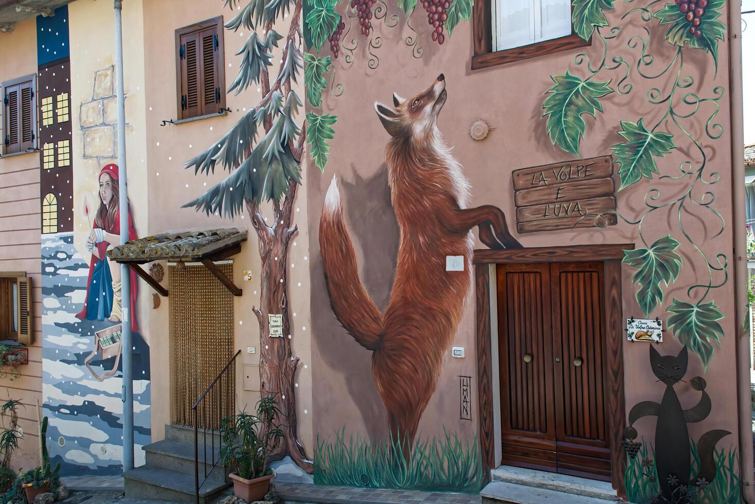Viterbo Sant'Angelo di Roccalvecce, Italy 24 August,2024 Il paese delle fiabe, the Land of Fairy Tales, for its facades embellished with fairy tale illustrations. photo
