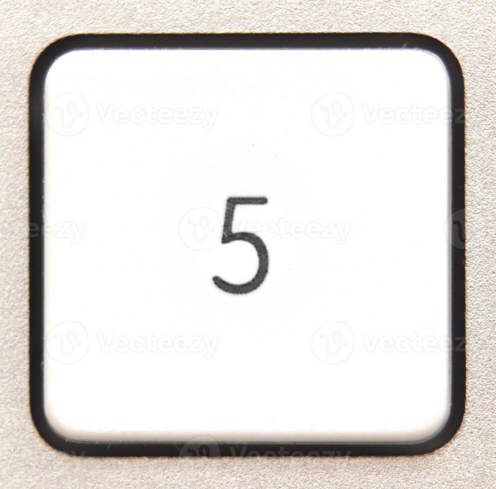 Button 5 from a modern numpad. photo