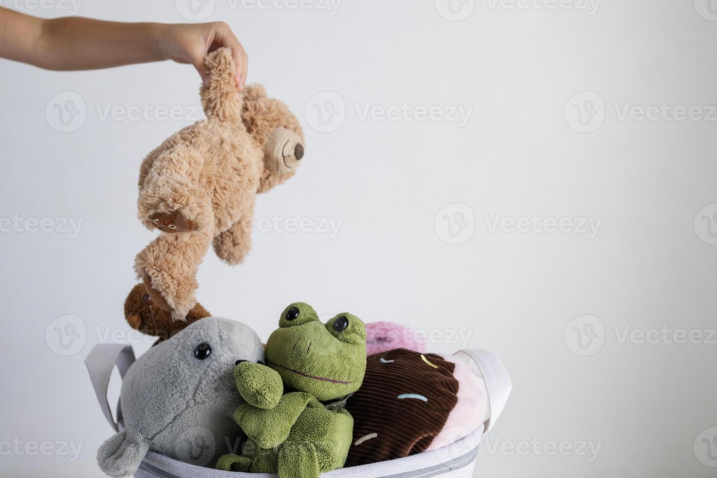 Baskets filled with toys and plush animals, encouraging recycling, reusing, and a sustainable lifestyle. photo