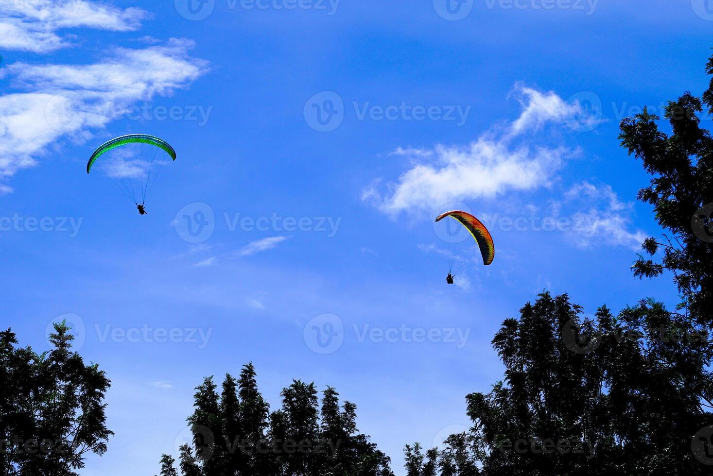 Paragliding on the mountains, Puncak Bogor, West java, indonesia. photo