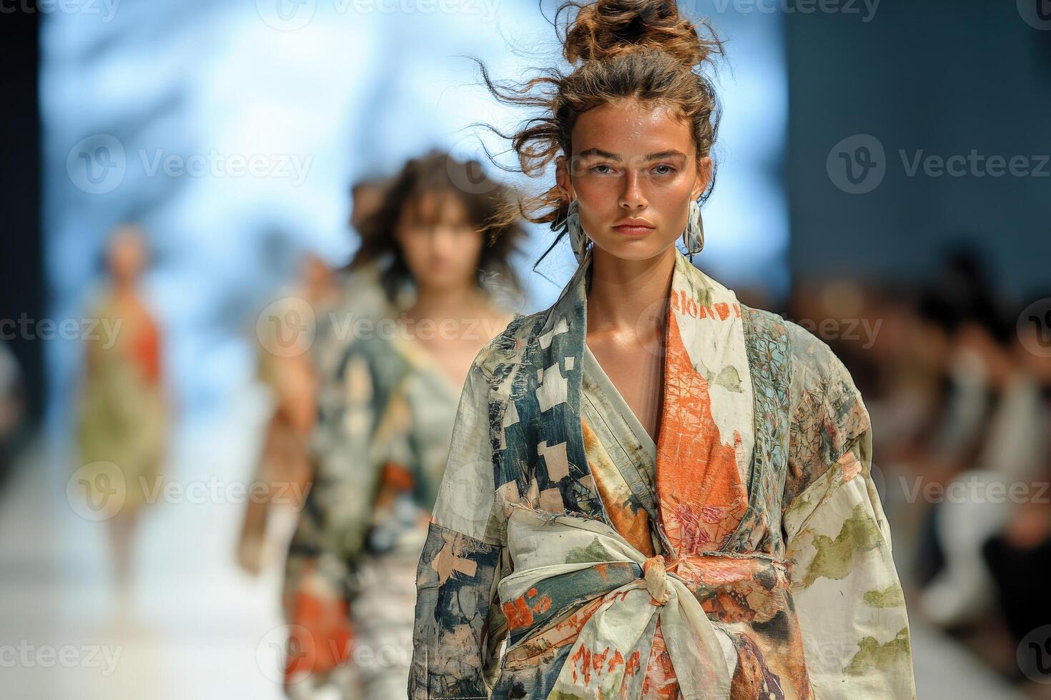 Models showcase unique designs on the runway during fashion week photo