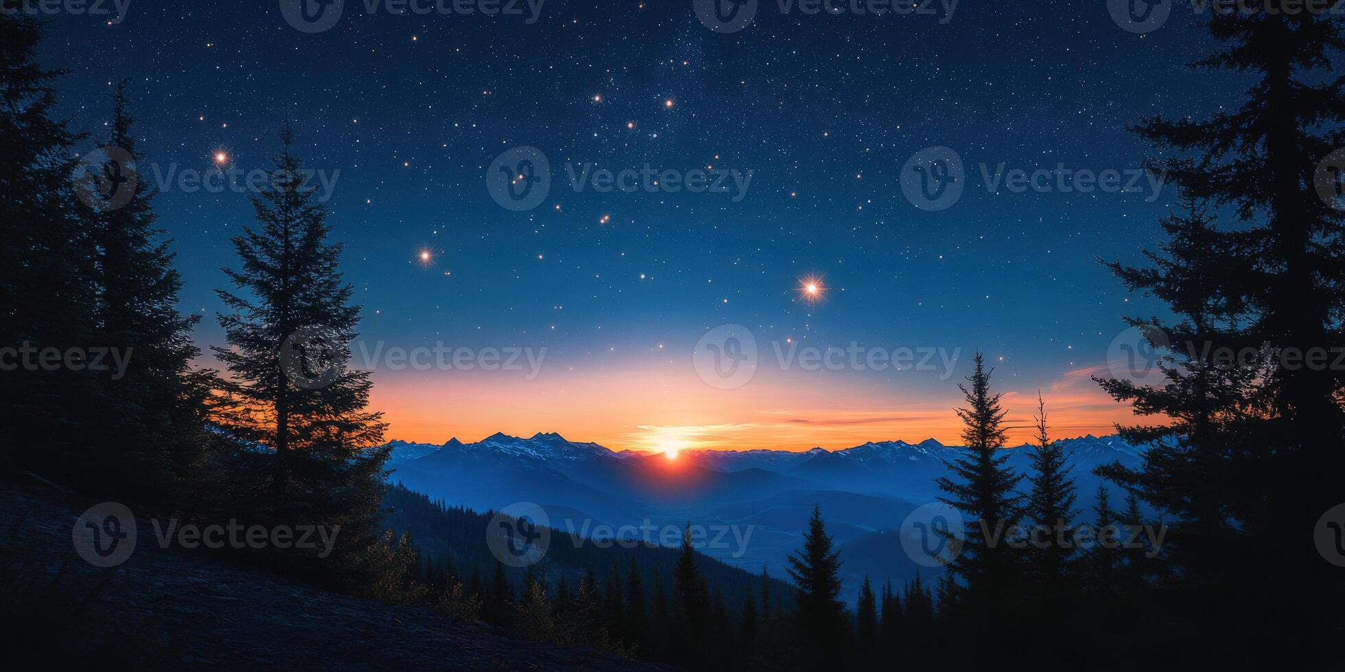 The sun sets over the mountains and stars in the sky photo