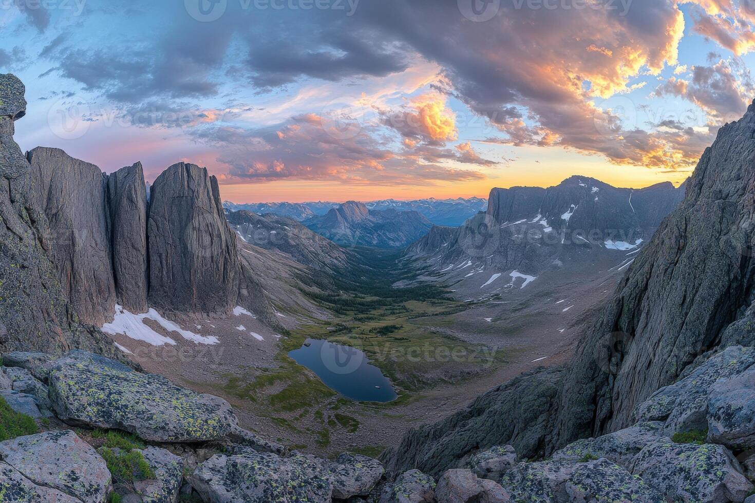 A panoramic view of the mountains at sunset photo