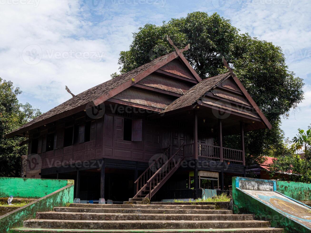 A wide shot of Traditional ethnic house from Selayar island regency South Sulawesi Indonesia in bright sun photo