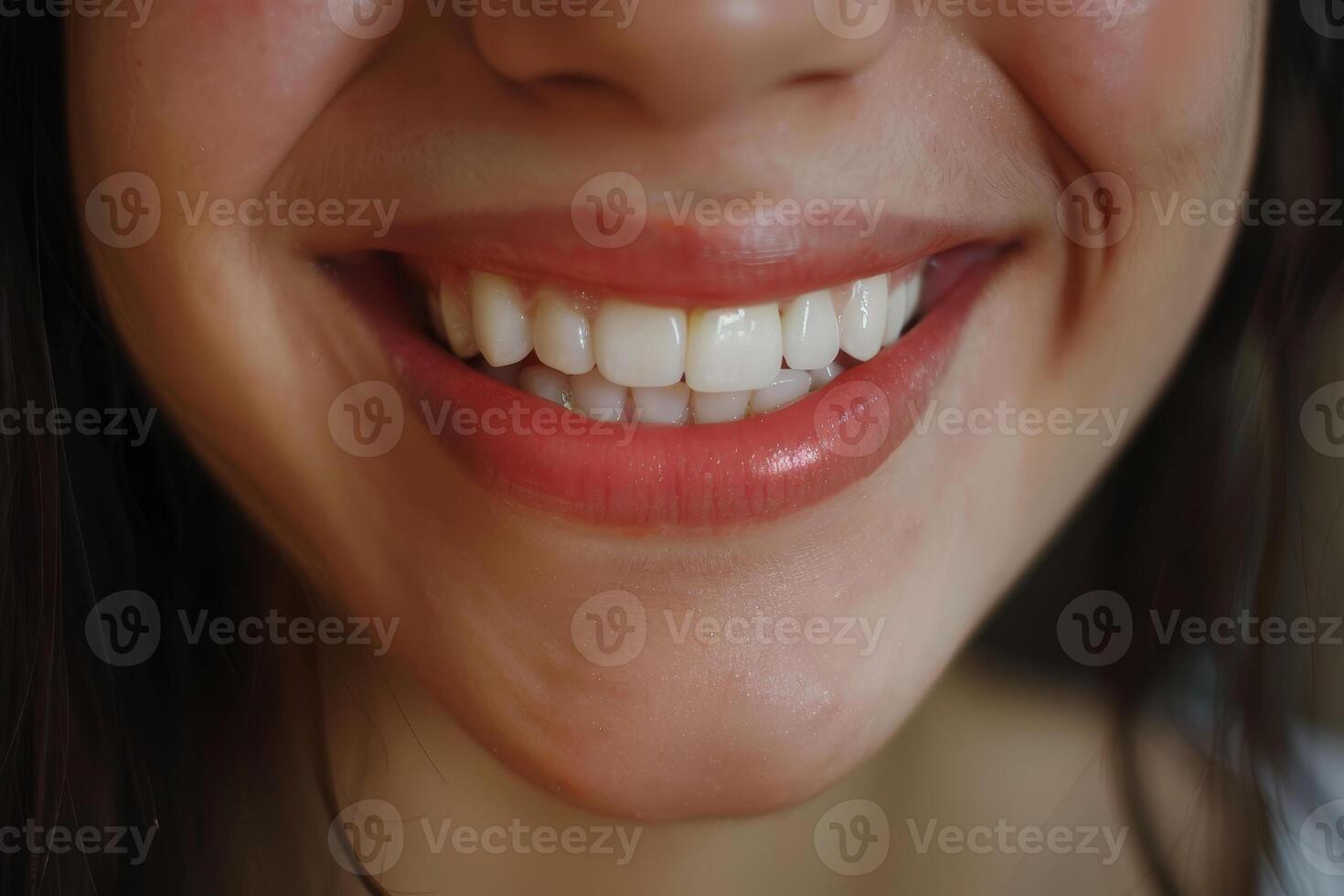 A close up of a woman's smile photo