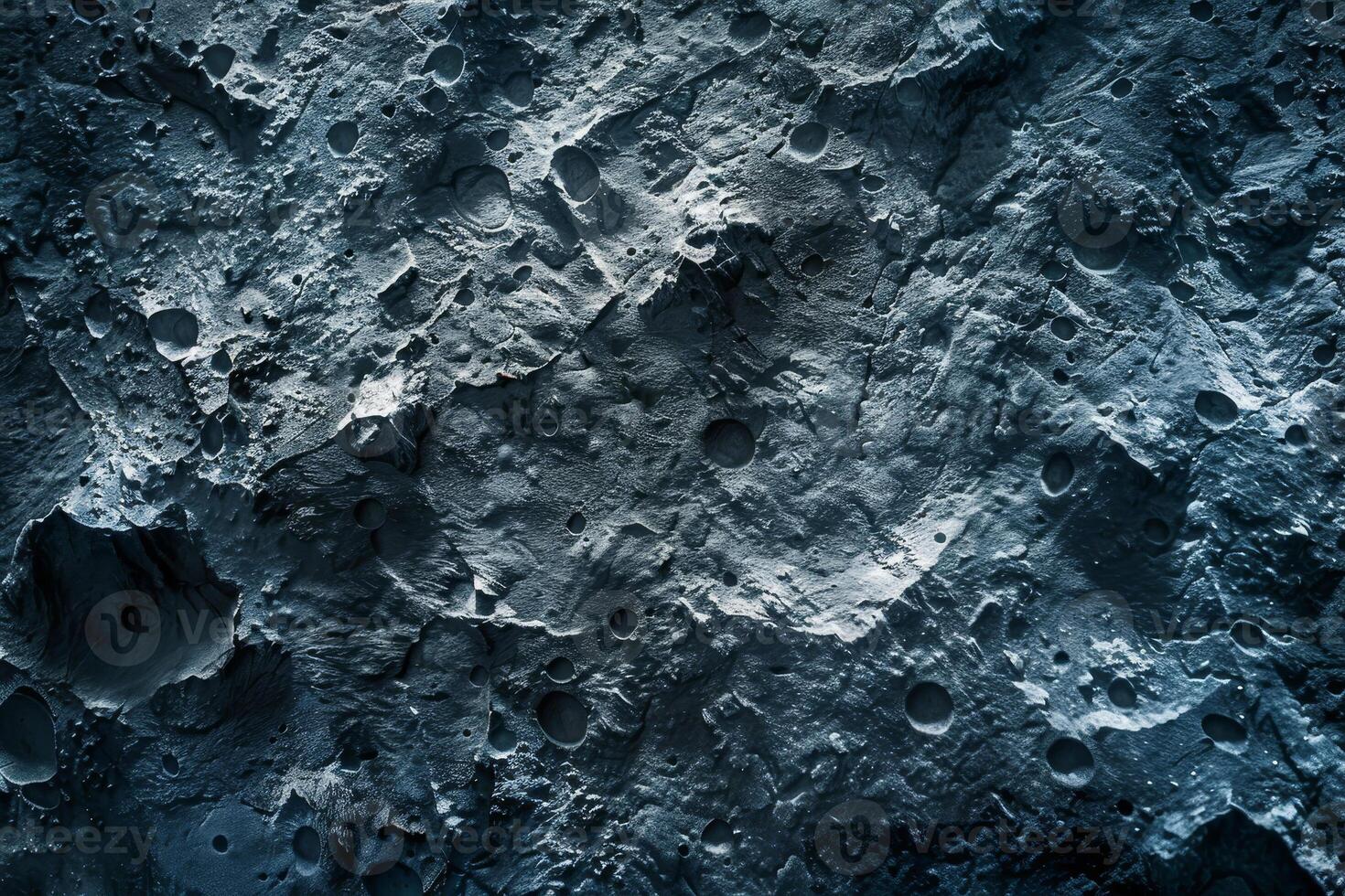 A close up of a rock wall with some small holes photo