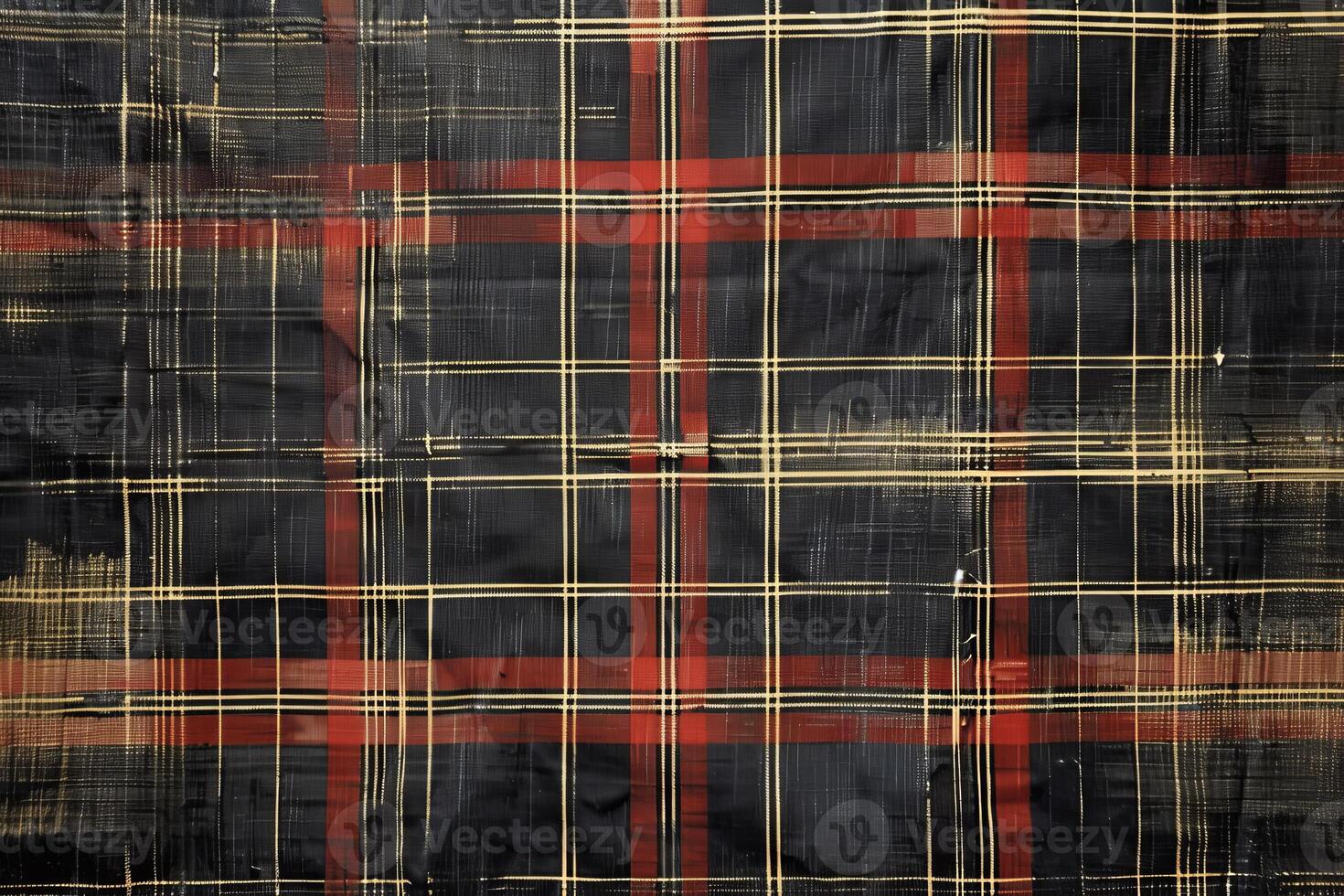 A black and red plaid fabric with a red and black checkered pattern photo