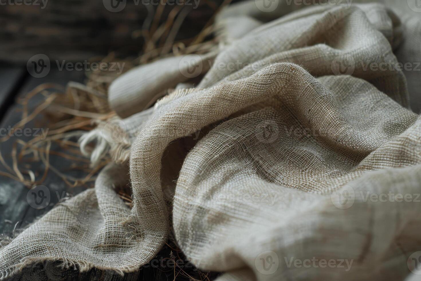 A close up of a piece of cloth on a wooden table photo