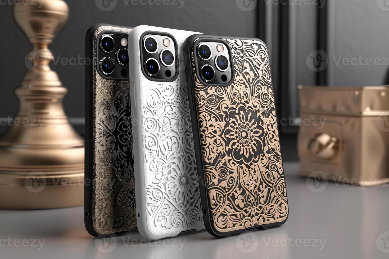 Three cell phone cases with floral designs are displayed on a table photo