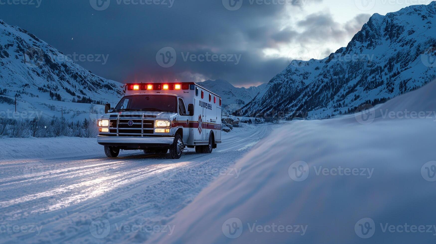 A white ambulance with red lights is driving down a snowy road photo