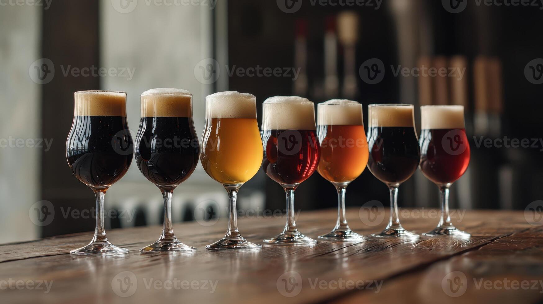 A row of beer glasses lined up on a table photo