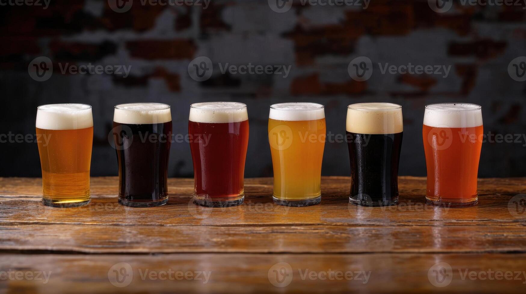 Six different types of beer are lined up on a table photo