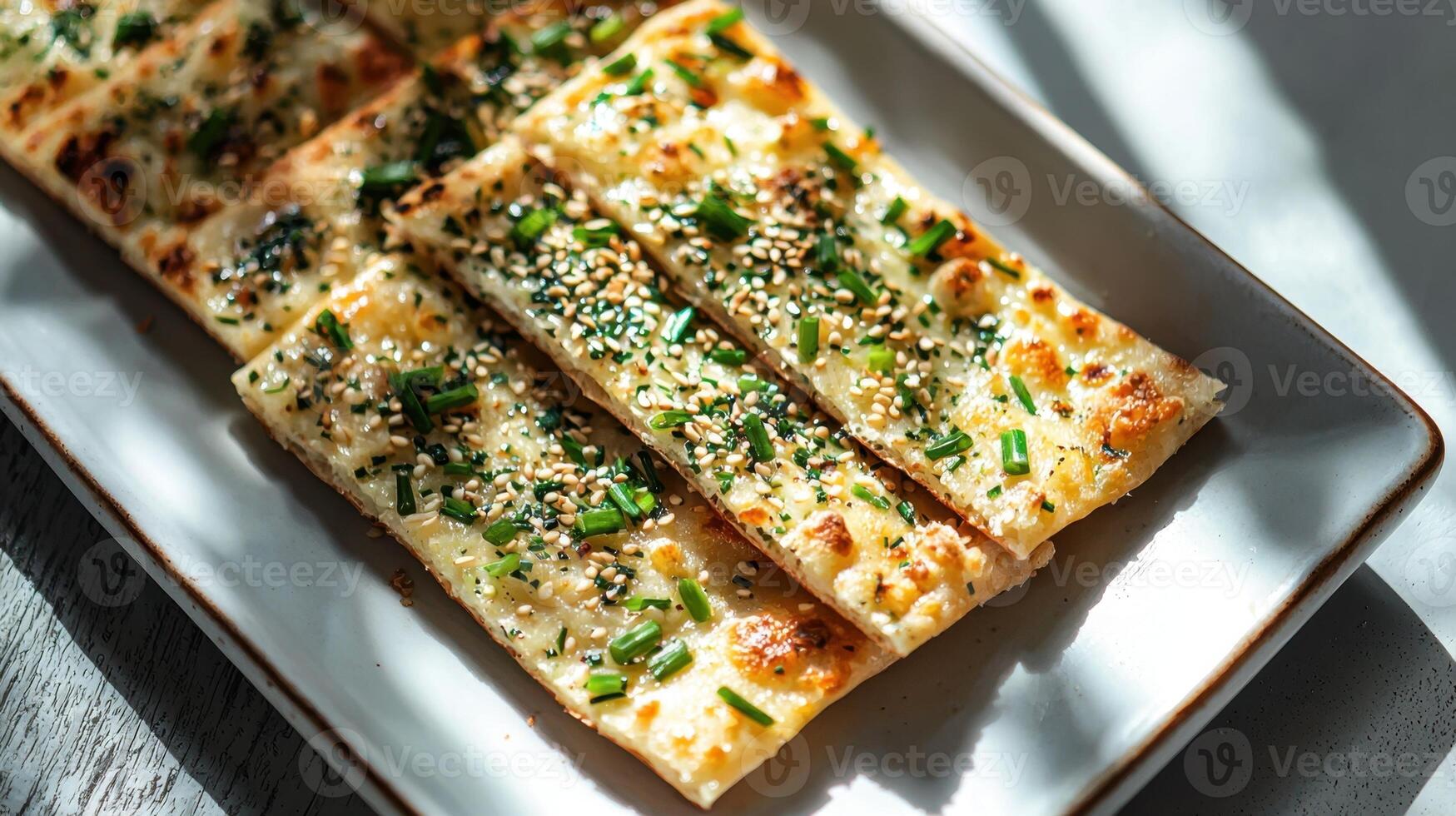 A white plate topped with bread slices photo