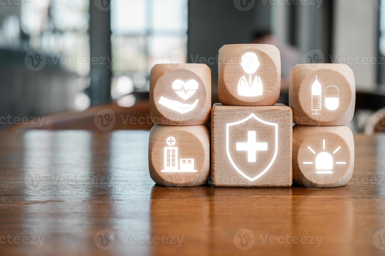 Wooden blocks with medical icons representing healthcare and Medicare concepts in a modern office environment. photo