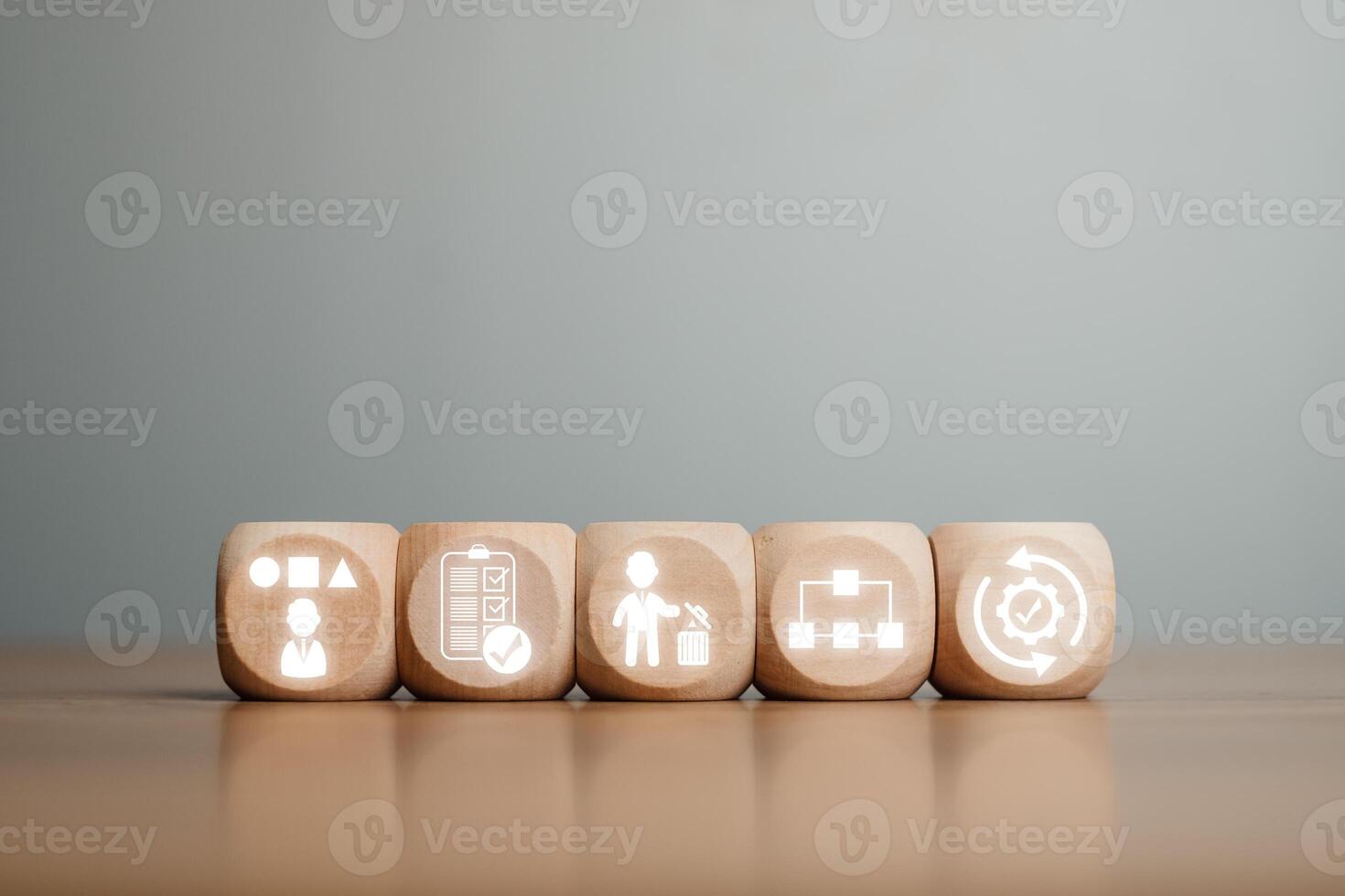 Wooden blocks depicting the 5S methodology icons for improving workplace organization and efficiency. photo