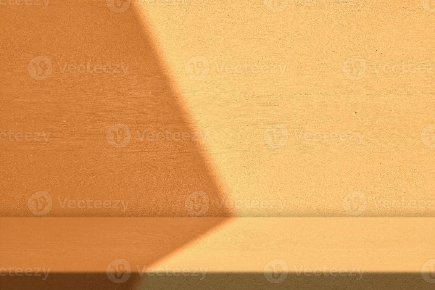 Concrete Table with Light Beam and Shadow on Wall Background in Light Orange photo