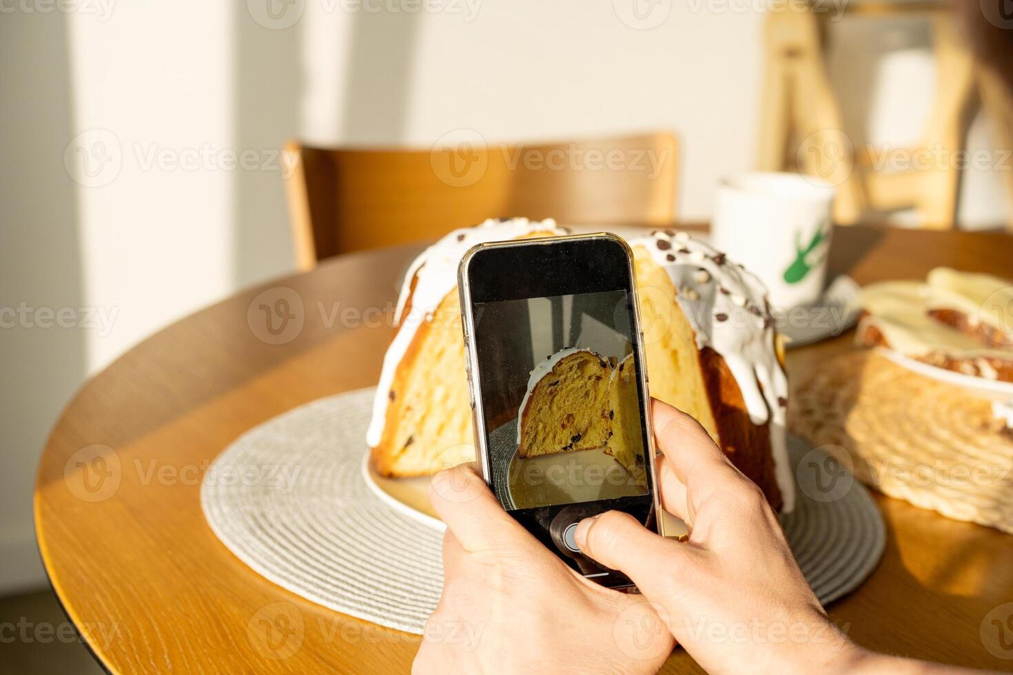 Baking a festive easter panettone with icing on a kitchen countertop during springtime preparations photo