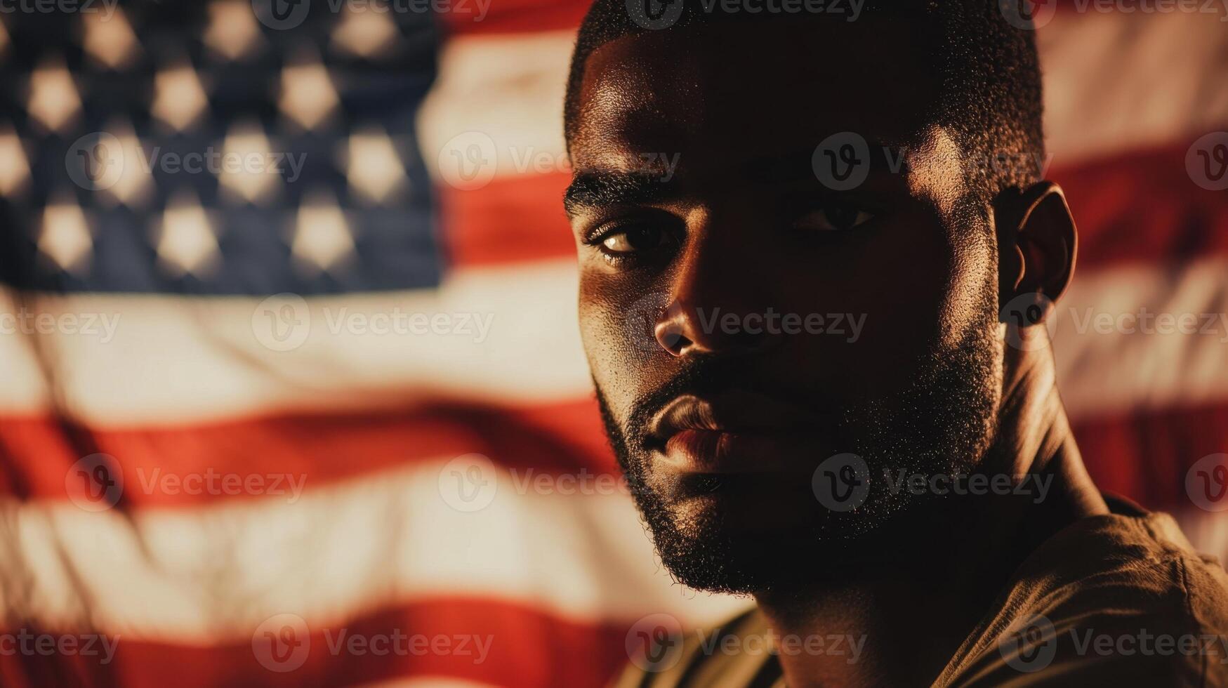 A man in front of an american flag photo