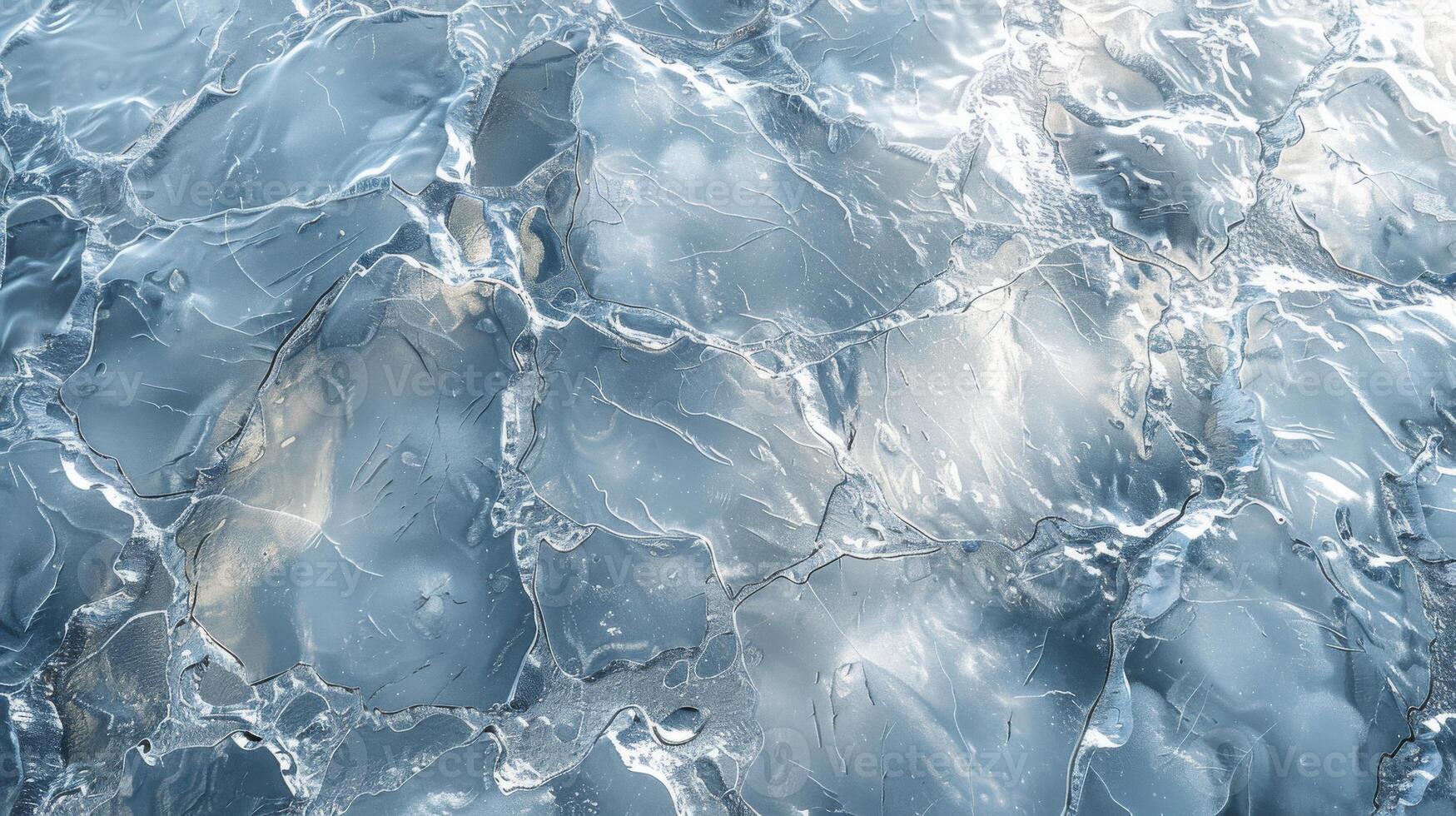 Frozen lake expanding under bright light, showcasing intricate patterns of cracks in the ice surface. The clear blue ambiance highlights the beauty of winter. photo